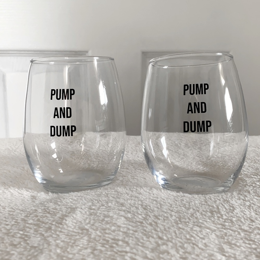 2 Stemless wine glasses that say “PUMP AND DUMP”